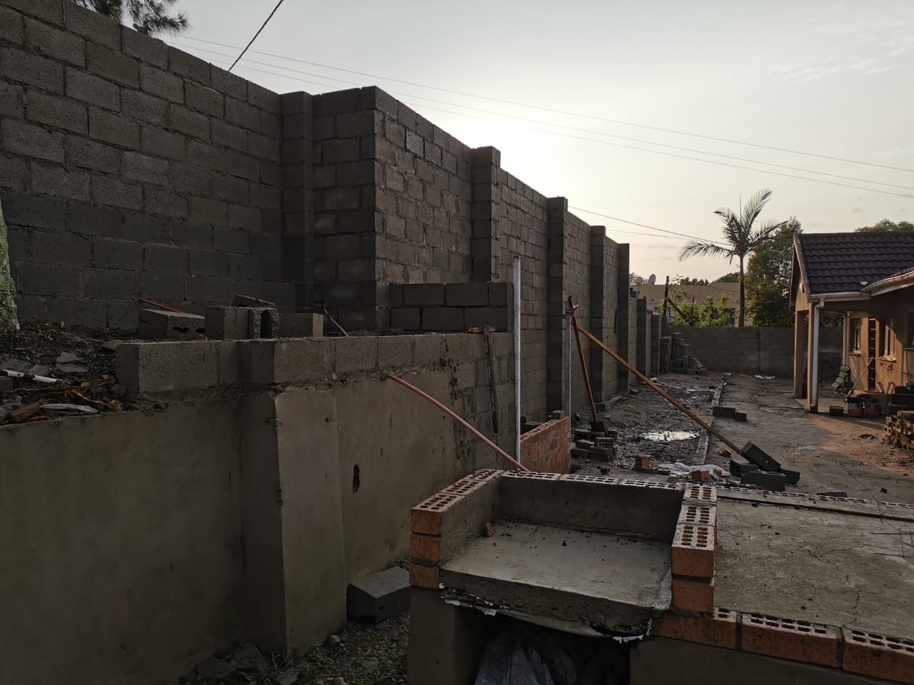 Retaining wall and masonry construction