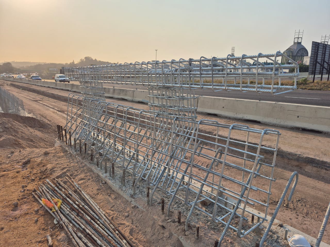 Steel reinforcement bars laid out for concrete foundation work
